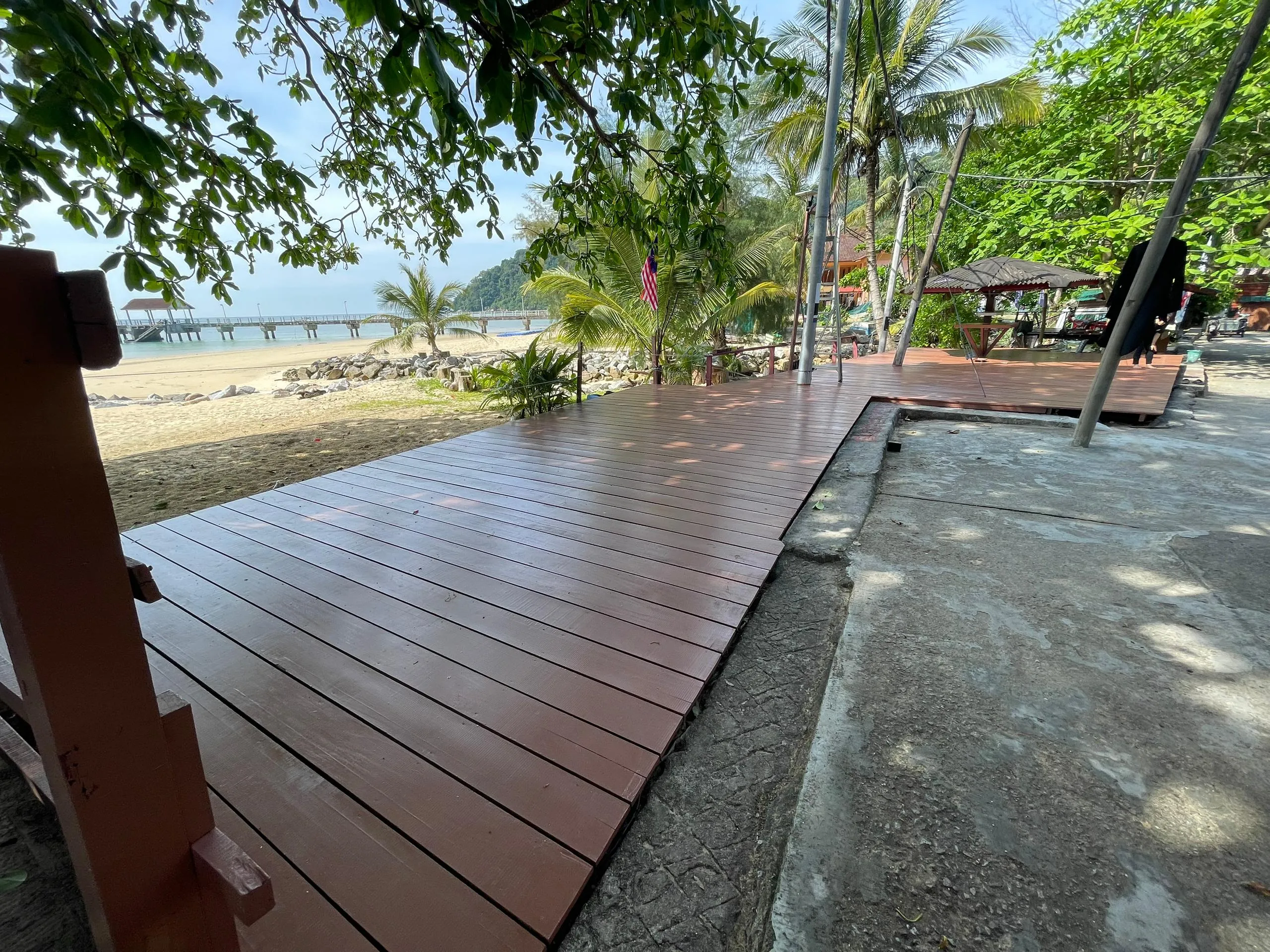 Deck near the beach and trees